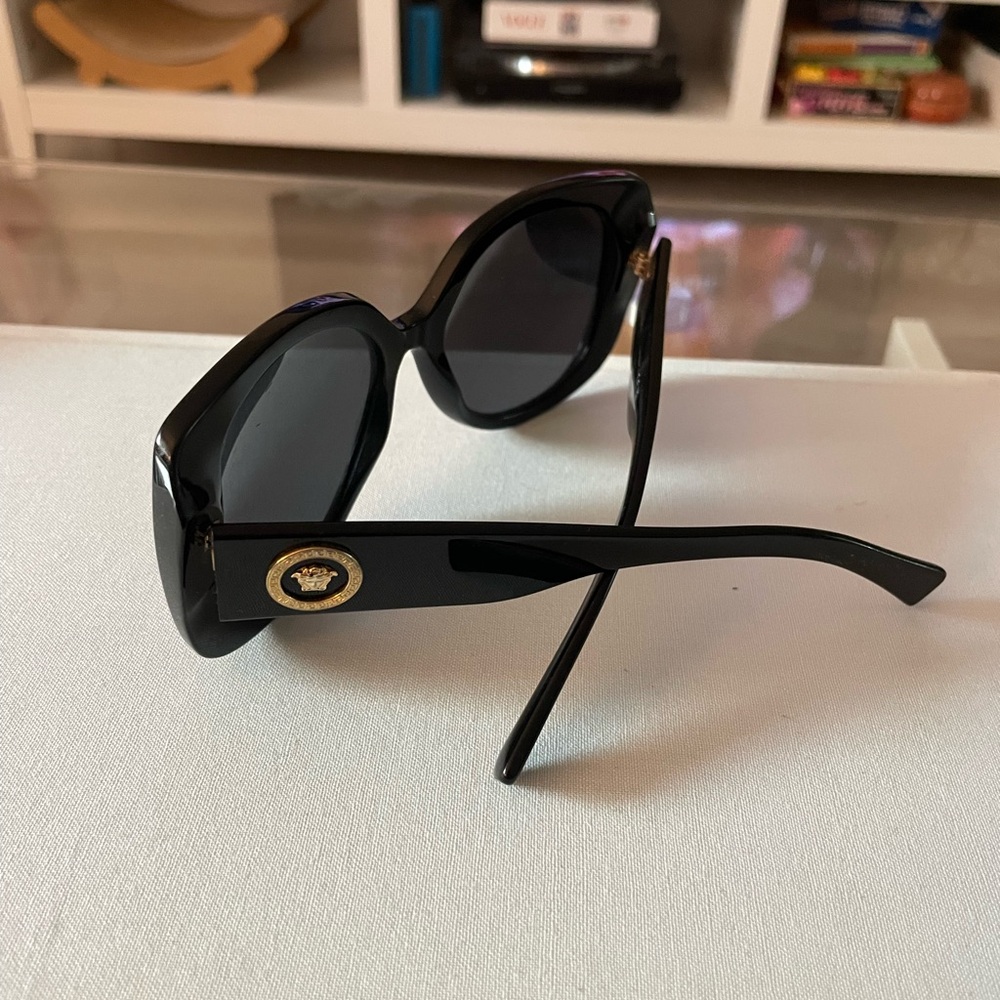 Versace 4387 Black Oversized Sunglasses with Gold Medallion Accent